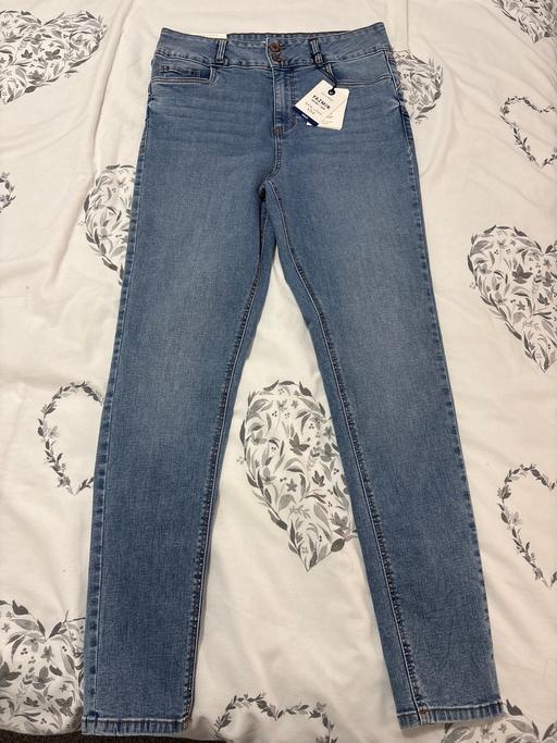  — Jeans
