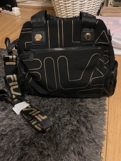  — Handbag