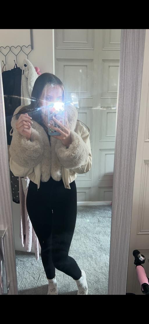  — Furr coat