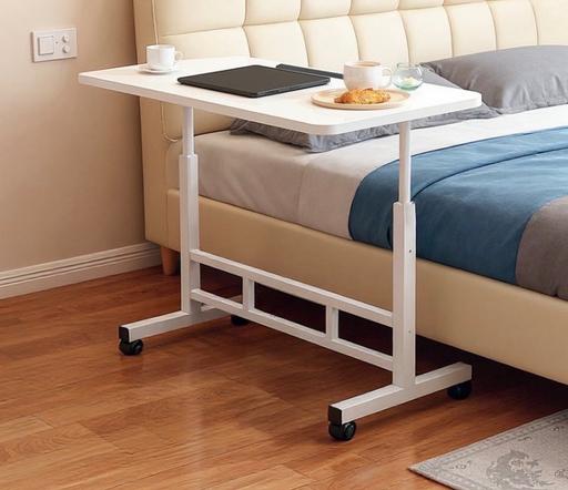  — Boxed Wheeled table 60 on x 40cm