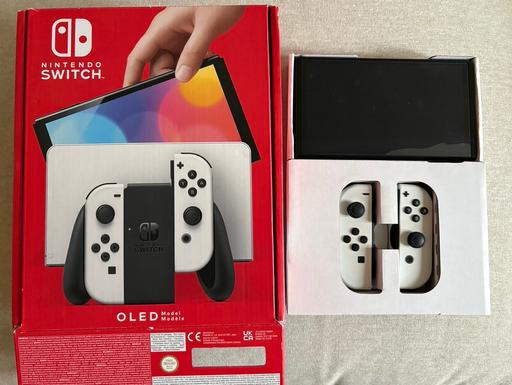  — Nintendo Switch OLED White + Pro Controller