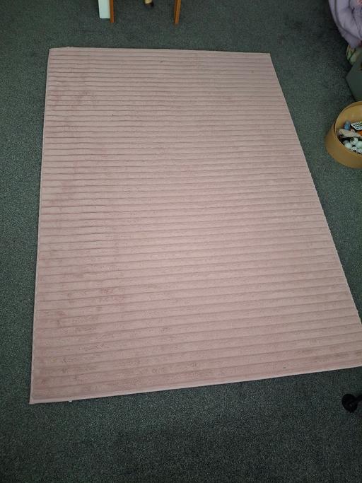  — large pink rug