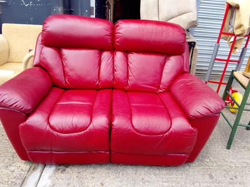  — red  leather recliner sofa