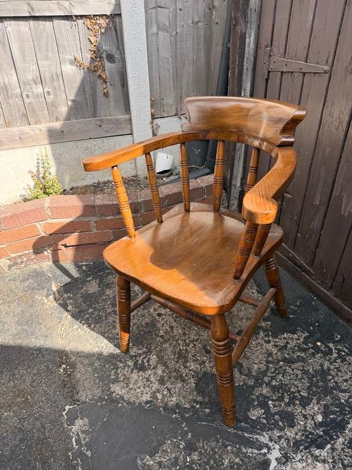  — Solid captains chair