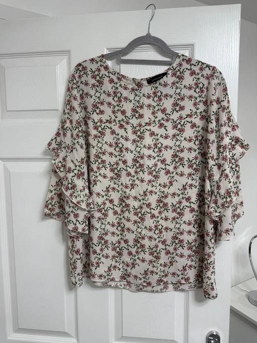  — Flowery top