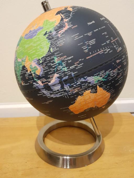  — Globe