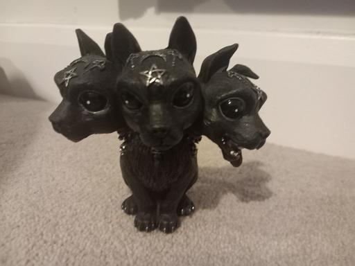  — statue