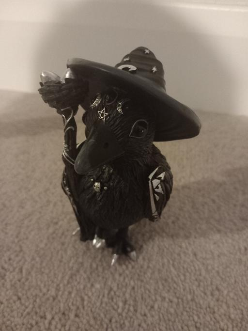  — bird statue