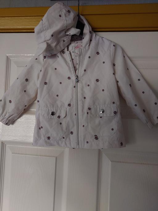  — Girls white coat size 12-18 months