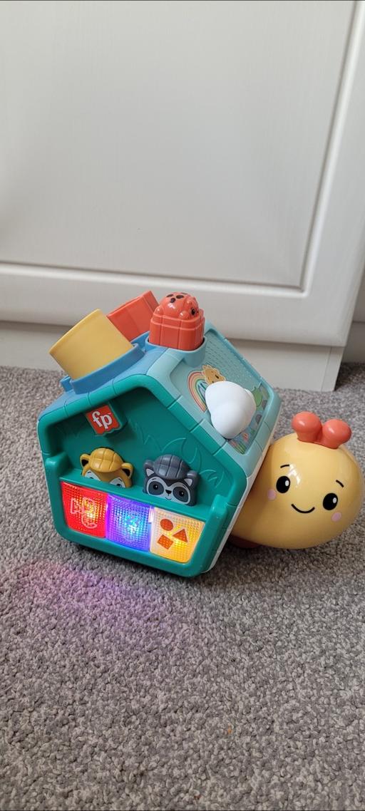  — Fisher price press and go activity snail