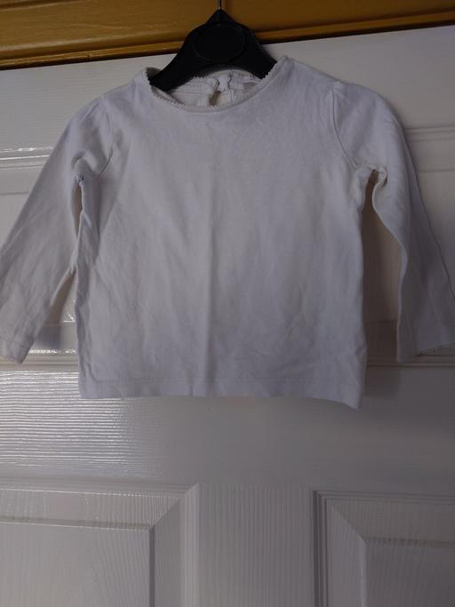  — Baby girls white long sleeve top size 6-9M