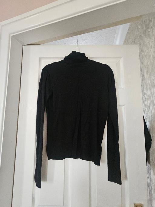  — Roll neck jumper, size 16.