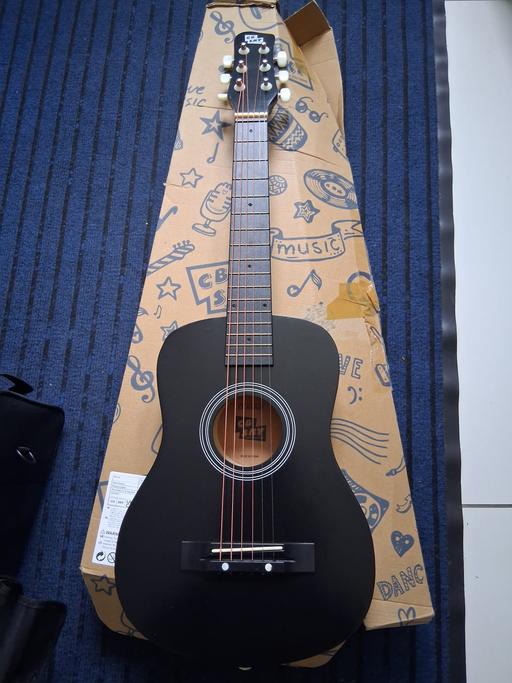  — child's guitar