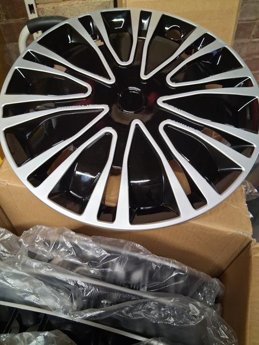  — wheel trims