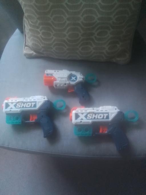  — THREE ZURI X  SHOT GUNS