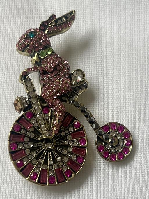  — Large pink brooch
