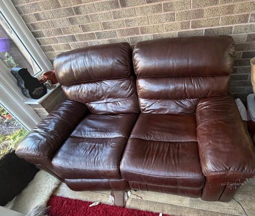  — Free to collector Leather sofa, recliner