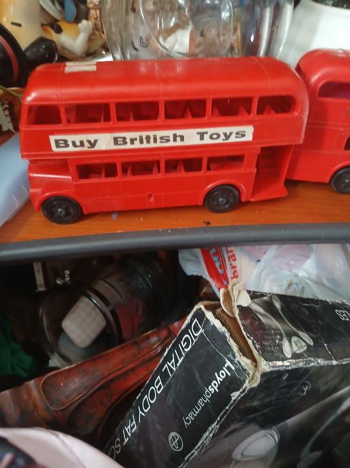  — old plastic bus about 8 ins across