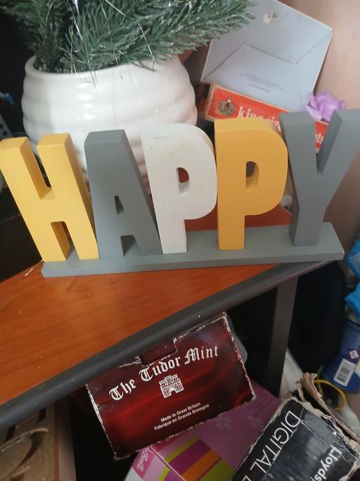  — happy wooden orniment