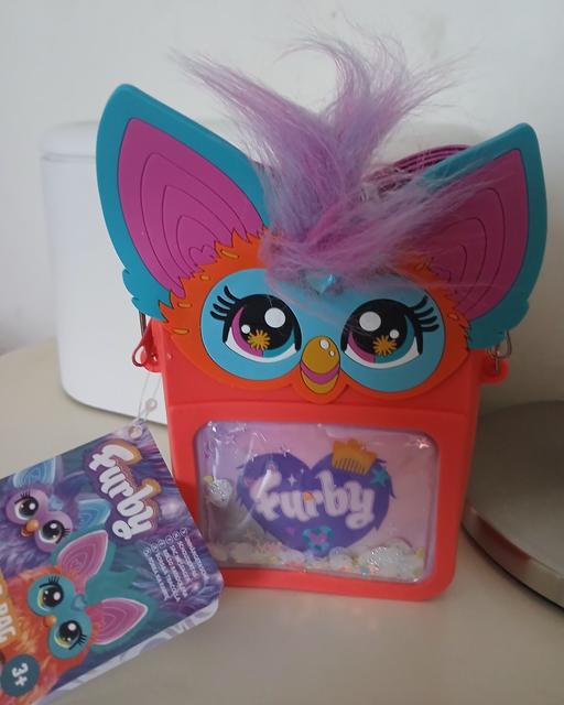 — Furby)