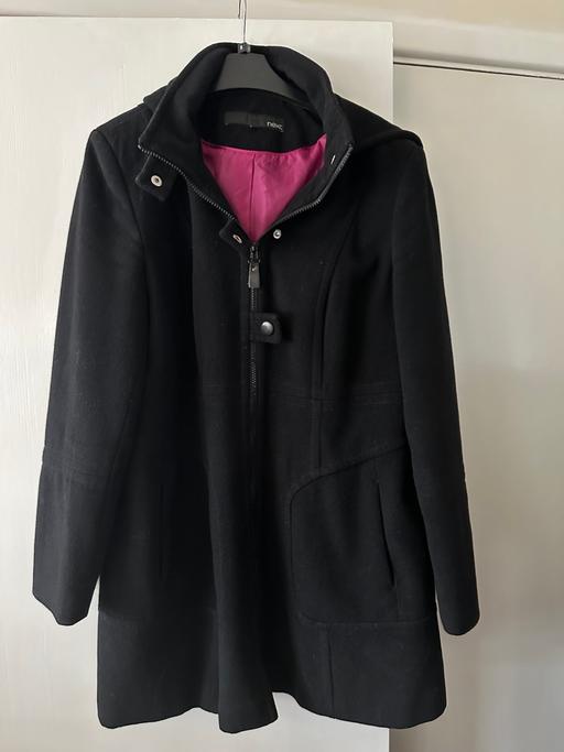  — Black coat