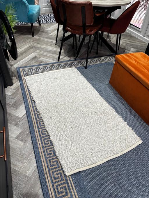  — New rug from range