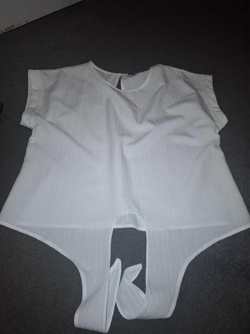  — ladies top size large