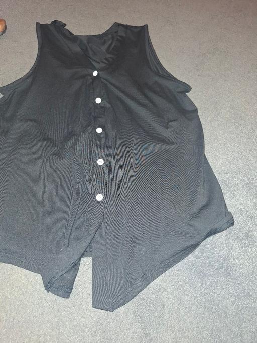 — ladies top size large