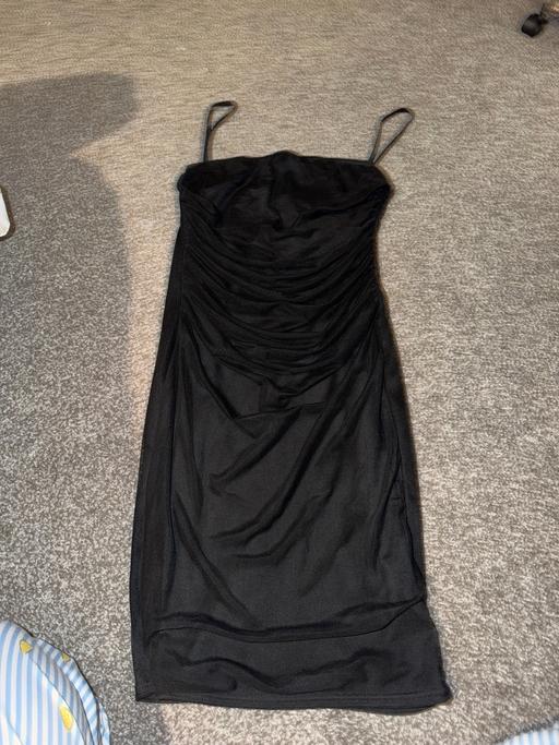  — Black dress