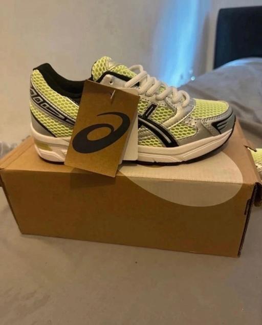  — ASICS Trainers