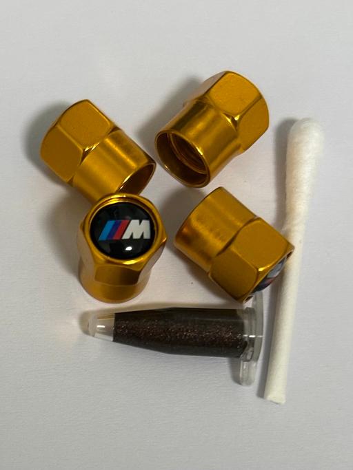  — BMW Tyre valve caps any two sets £4.00