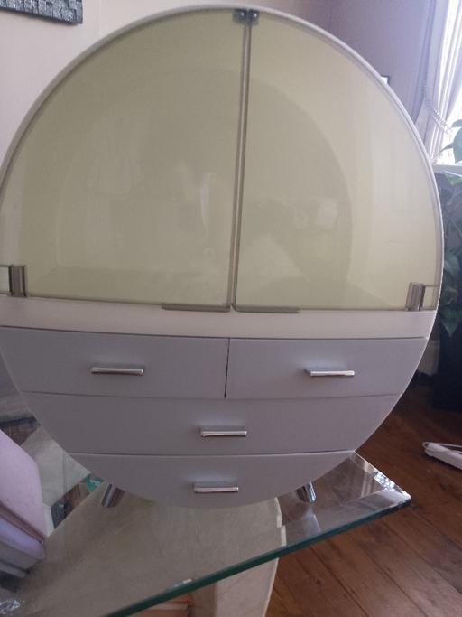  — Circular cabinet on legs