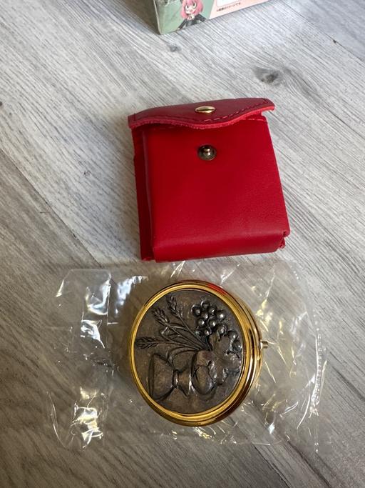  — Brand new small tin