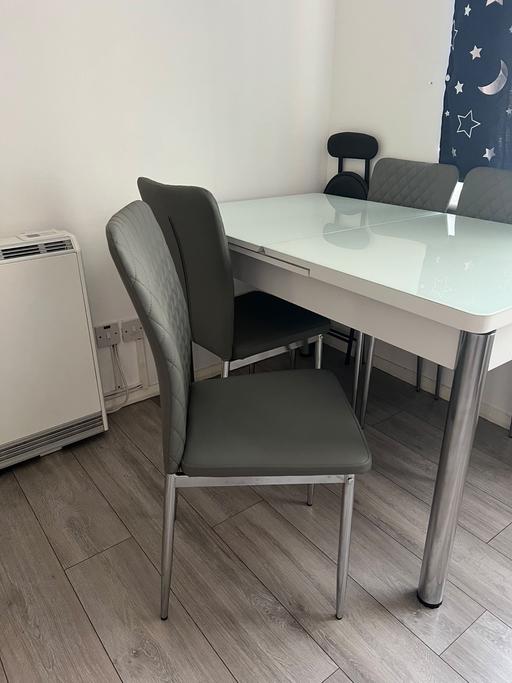  — Dining table with chairs