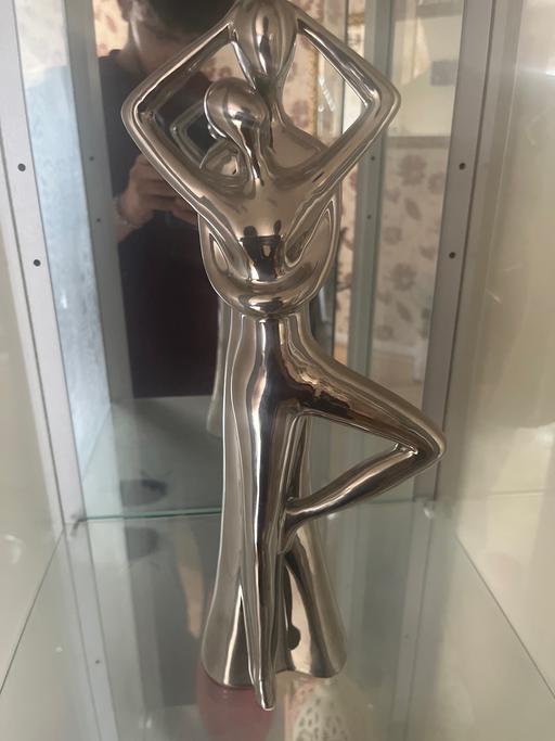  — Statue