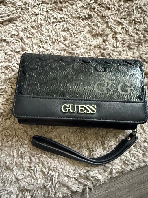  — Guess purse