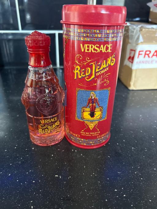  — New 75ml Versace red jeans