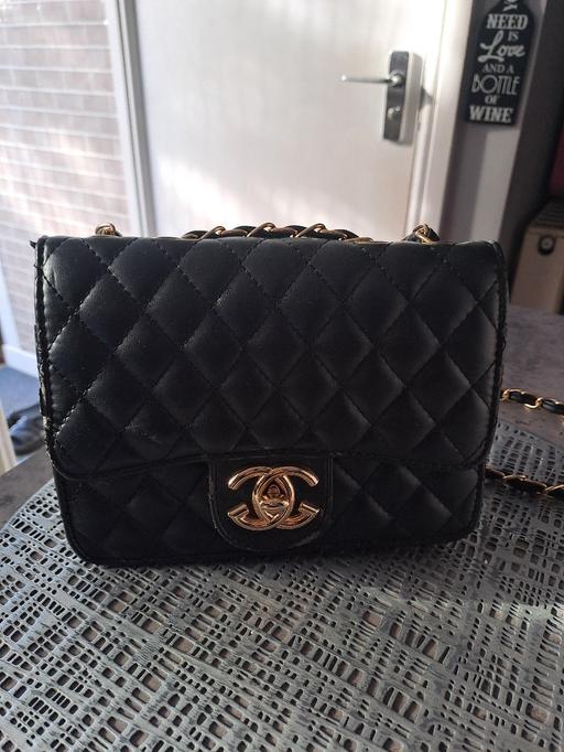  — handbag