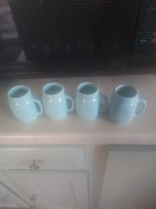  — FOUR BRAND NEW BIA INTERNATIONAL BEV MUGS