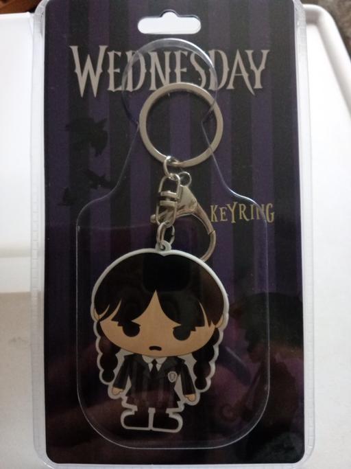  — brand new WEDNESDAY KEYRING SET