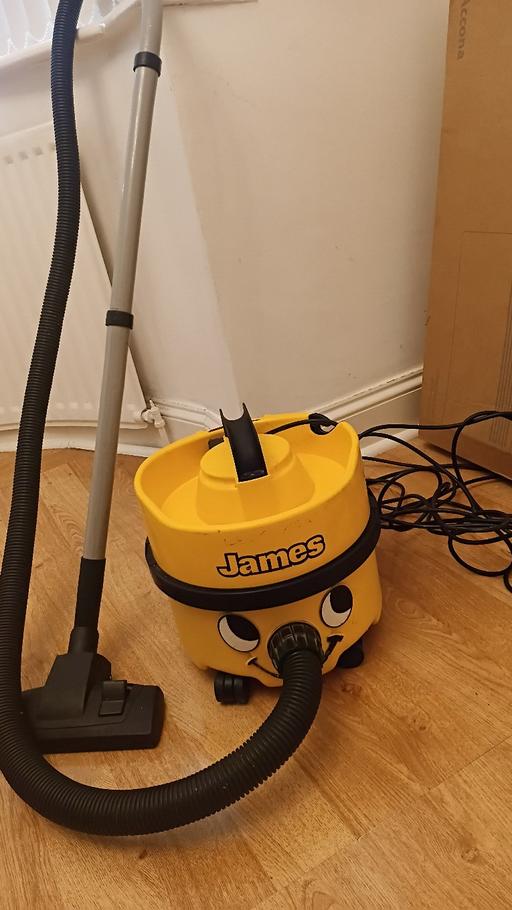  — JAMES VACUUM