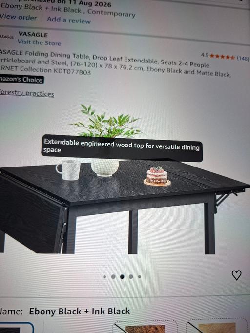  — Black Dining Table and 2 chairs.