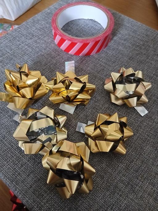  — Tape Bows New