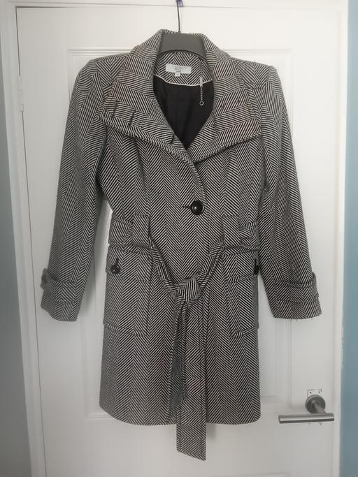  — coat