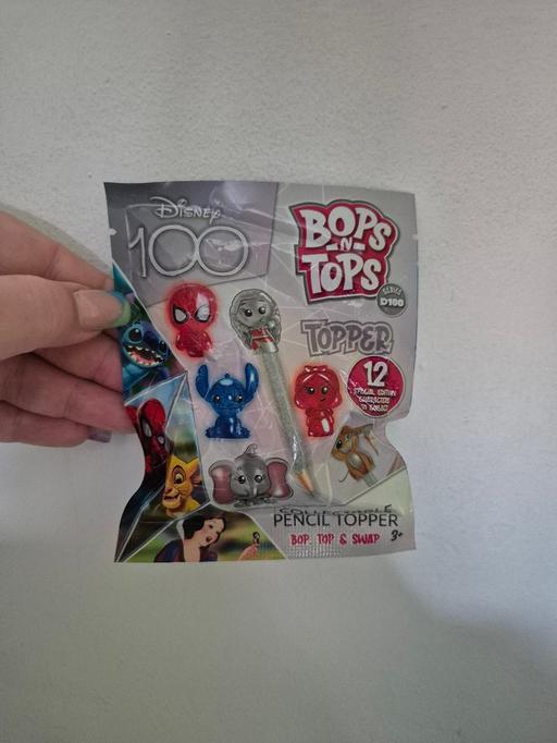  — new Disney 100 Bops N Tops Mystery Topper