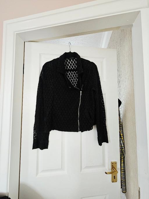  — Lace style jacket, size 12/14.