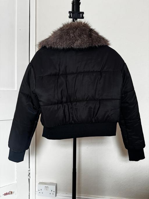 — Jacket