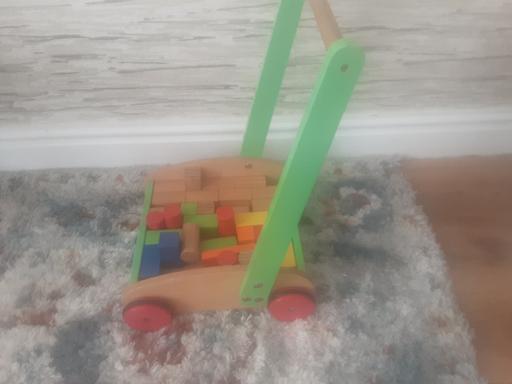  — Small child's wooden baby walker