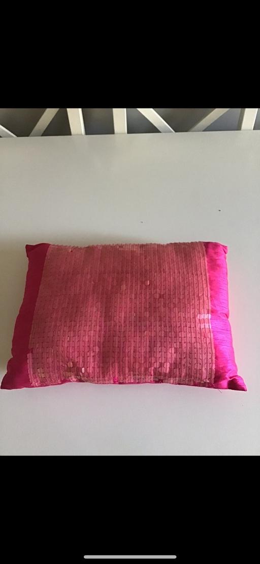  — Pink sequinned cushion