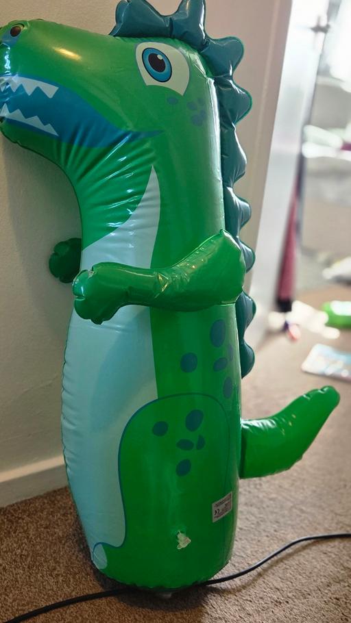  — large inflated dinosaur